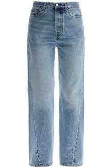 toteme wide leg organic cotton jeans in worn blue with twisted seams